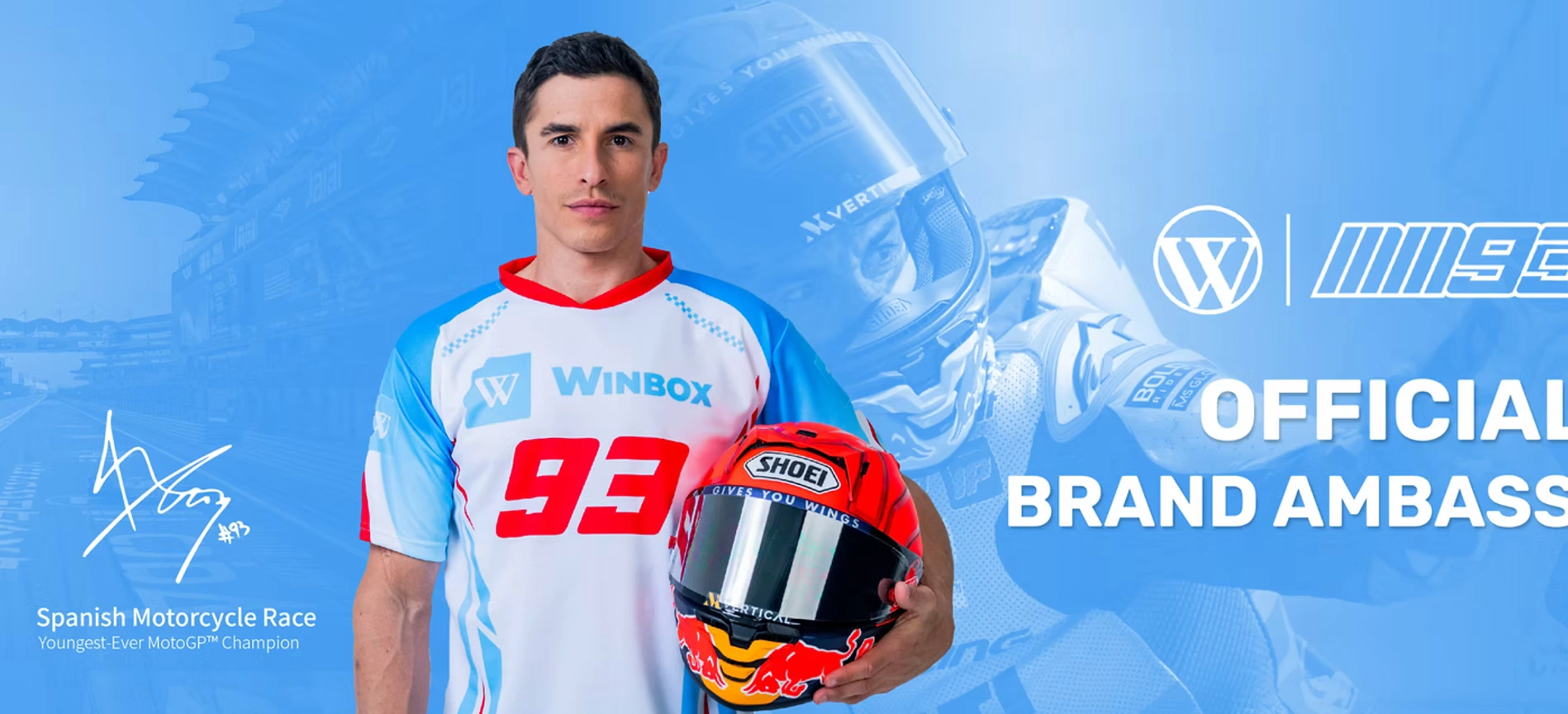 Marc Marquez wearing the official Winbox jersey while holding his racing helmet as the Official Winbox Brand Ambassador and MotoGP Champion.